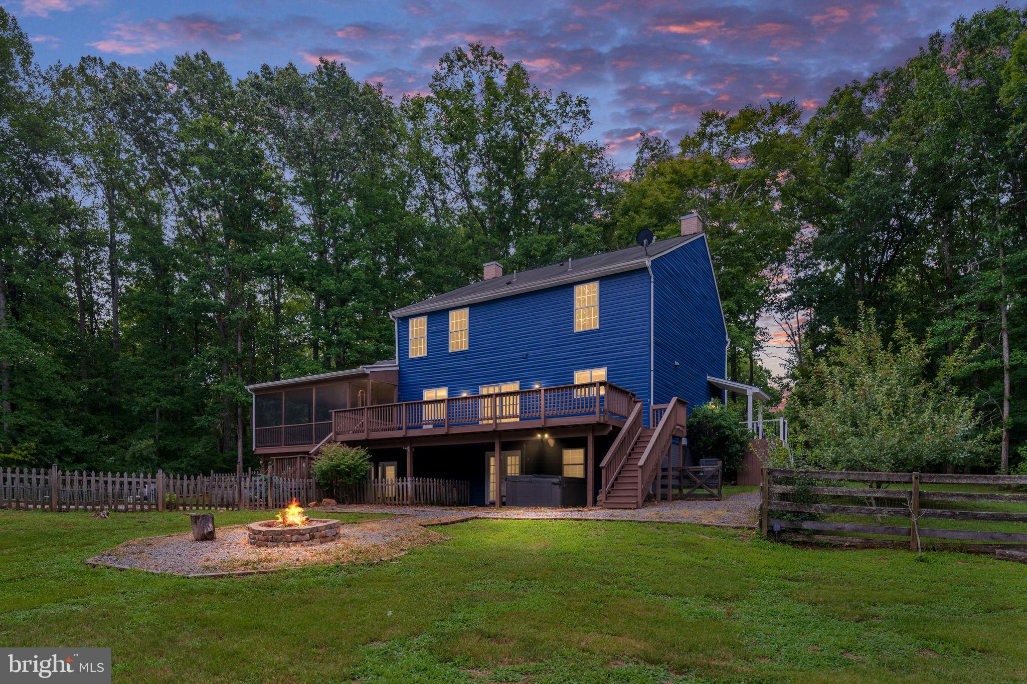 60 River Falls Road Fredericksburg, VA 22406 - Photo 57 of 73 Twilight photo of the fire pit area