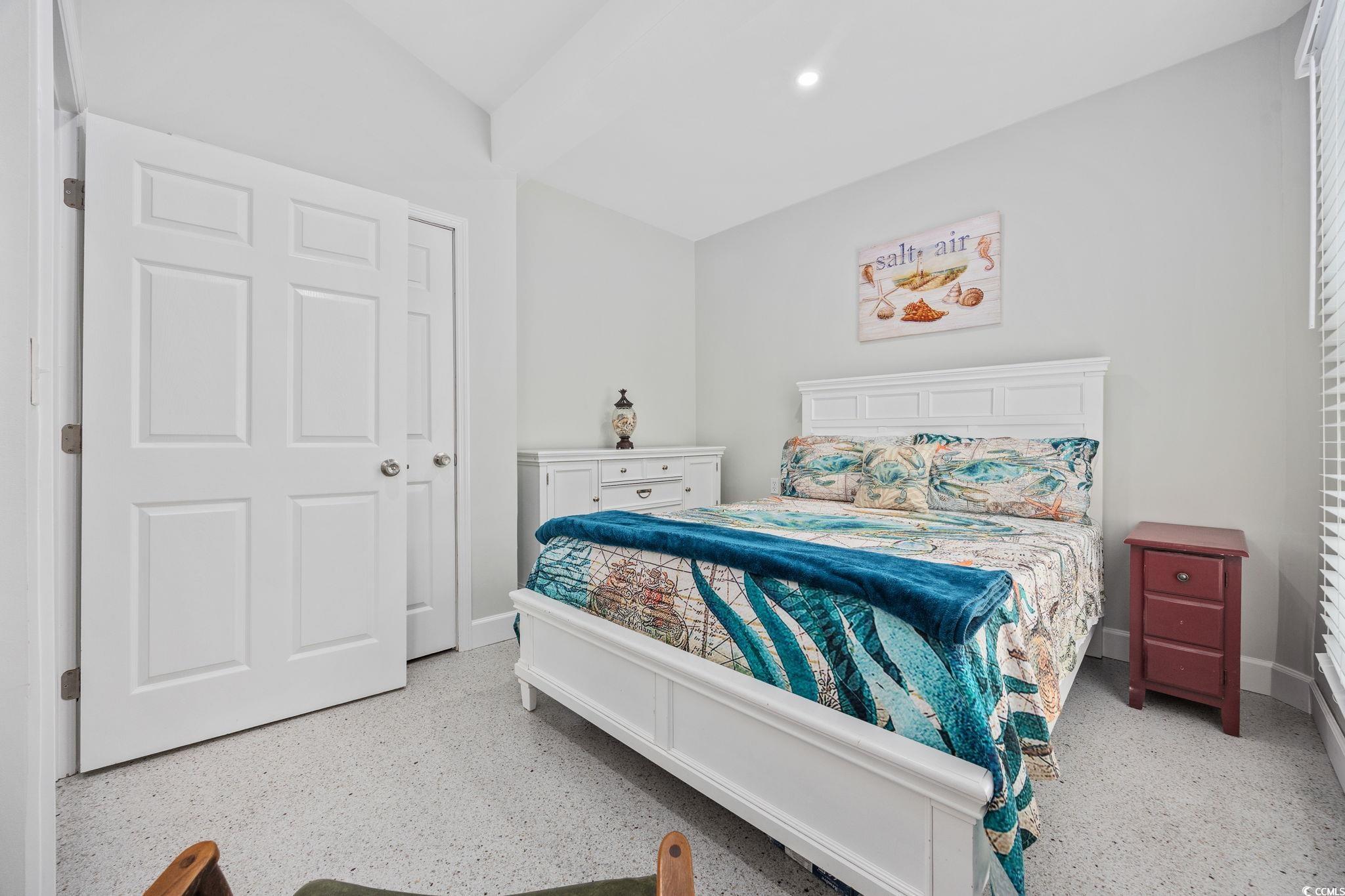 3118 State Rd S-26-816 Murrells Inlet, SC 29576 - Photo 23 of 40 Bedroom featuring dark aggregate flooring