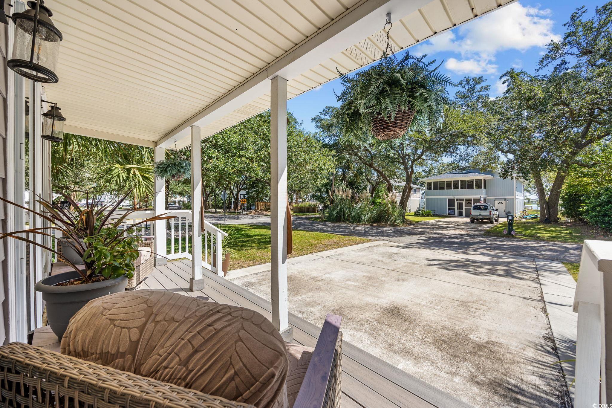 3118 State Rd S-26-816 Murrells Inlet, SC 29576 - Photo 3 of 40 View of wooden porch