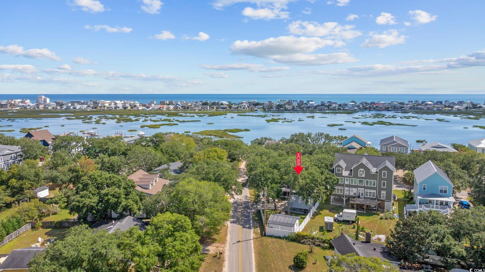 3118 State Rd S-26-816 Murrells Inlet, SC 29576 - Photo 39 of 40 Aerial view of residential area with a nearby body of water