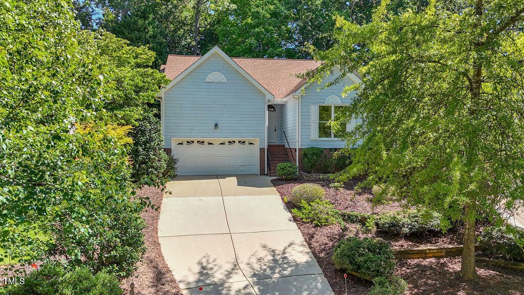 125 Chimney Rise Drive Cary, NC 27511 - Photo 2 of 41 a view of a house with a yard