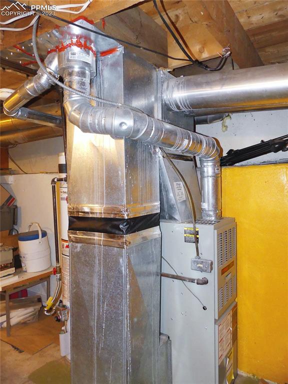 811 Prairie Road Colorado Springs, CO 80909 - Photo 24 of 34 a view of a room with gym equipment