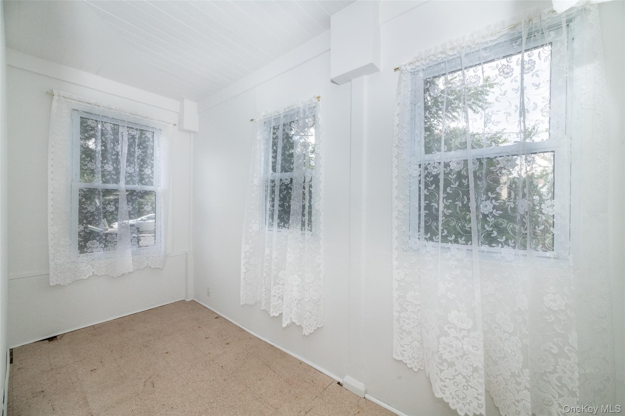 157 Schofield Street Bronx, NY 10464 - Photo 18 of 34 a view of empty room with windows