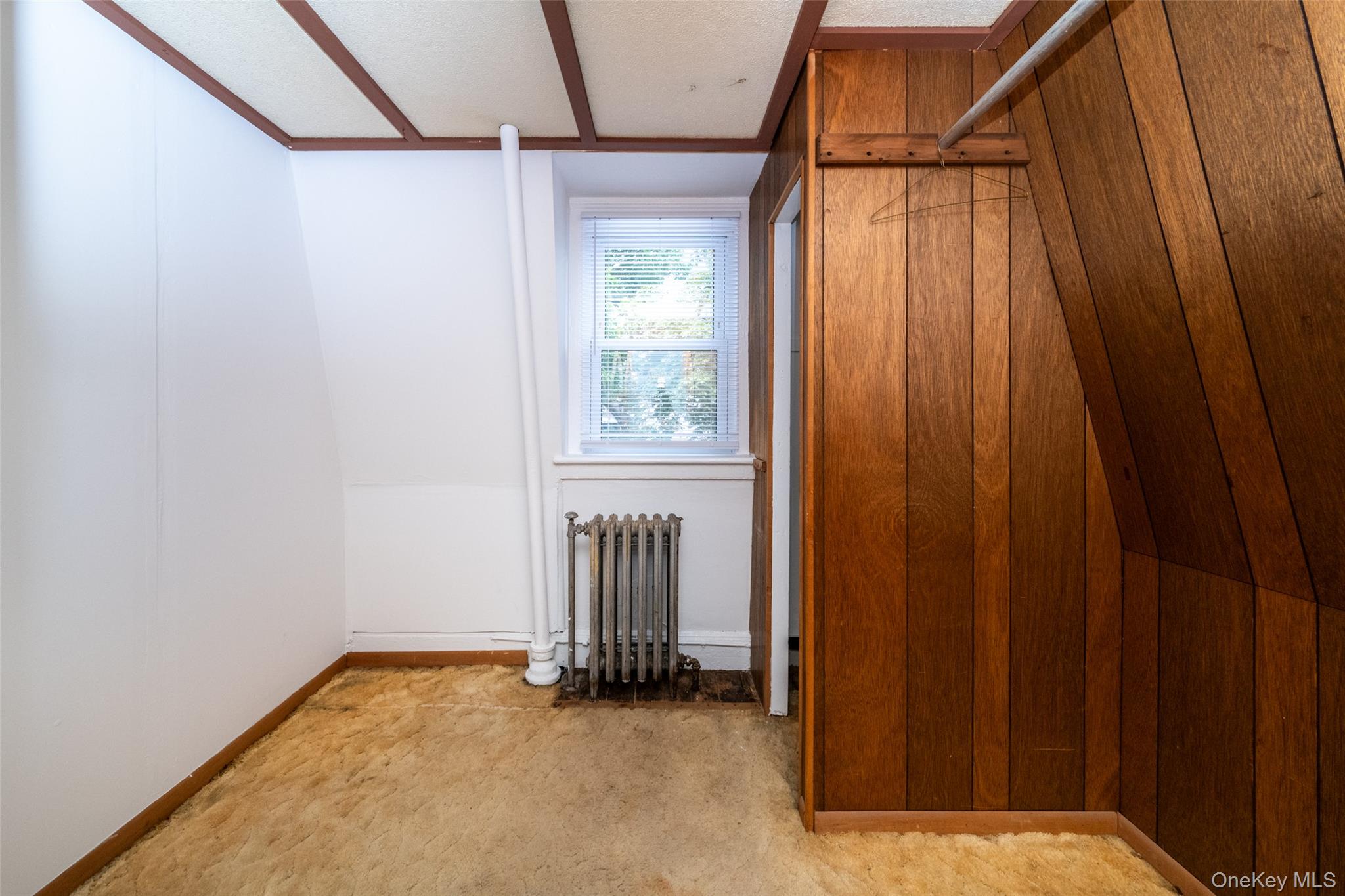 157 Schofield Street Bronx, NY 10464 - Photo 20 of 34 a view of entryway with wooden floor and walls