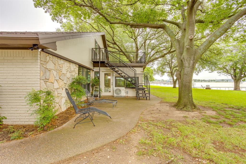 10814 Power Squadron Road Azle, TX 76020 - Photo 28 of 34 a view of a house with backyard and sitting area