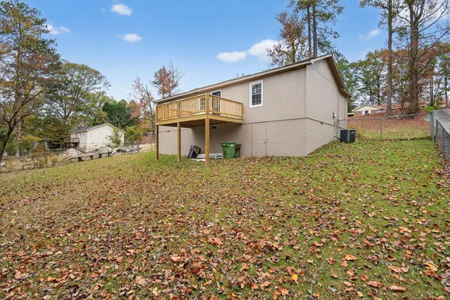 a house with trees in front of it