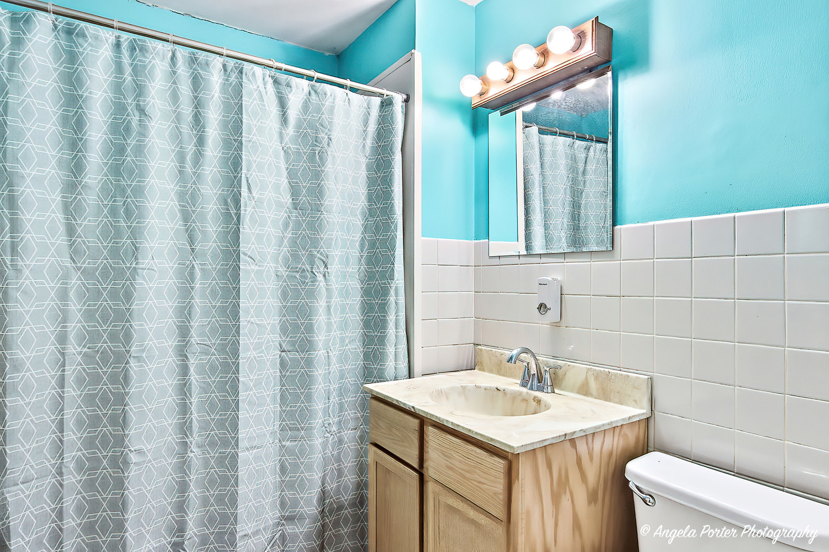 2504 West Algonquin Road, Unit 3 Rolling Meadows, IL 60008 - Photo 11 of 23 a bathroom with a sink and a mirror