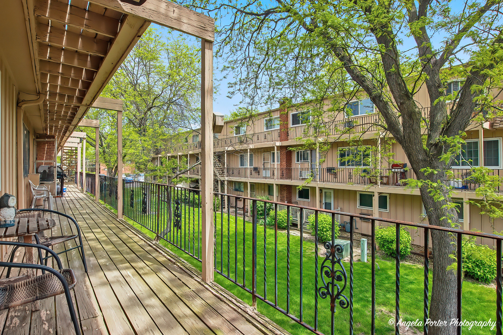 2504 West Algonquin Road, Unit 3 Rolling Meadows, IL 60008 - Photo 16 of 23 a balcony view with a large window and outdoor space