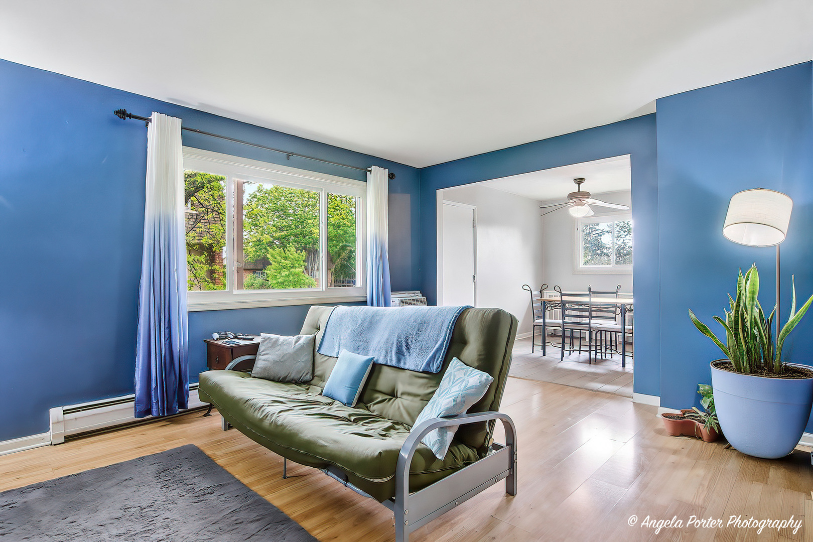 2504 West Algonquin Road, Unit 3 Rolling Meadows, IL 60008 - Photo 4 of 23 a living room with furniture and wooden floor