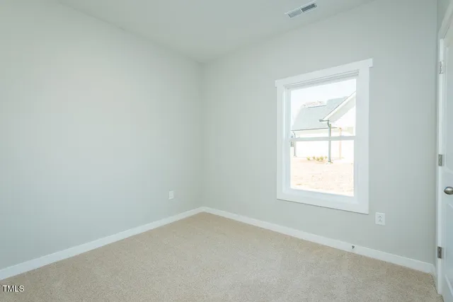 an empty room with closet