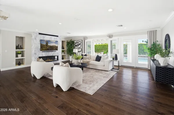 an aerial view of residential houses with outdoor space