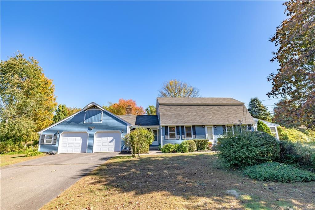 335 Rye Street East Windsor, CT 06016 - Photo 1 of 1 a front view of a house with a yard and garage