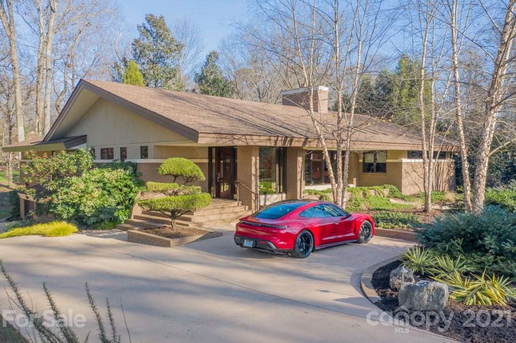 2827 Rothwood Drive Charlotte, NC 28211 - Photo 1 of 30 a car parked in front of a house