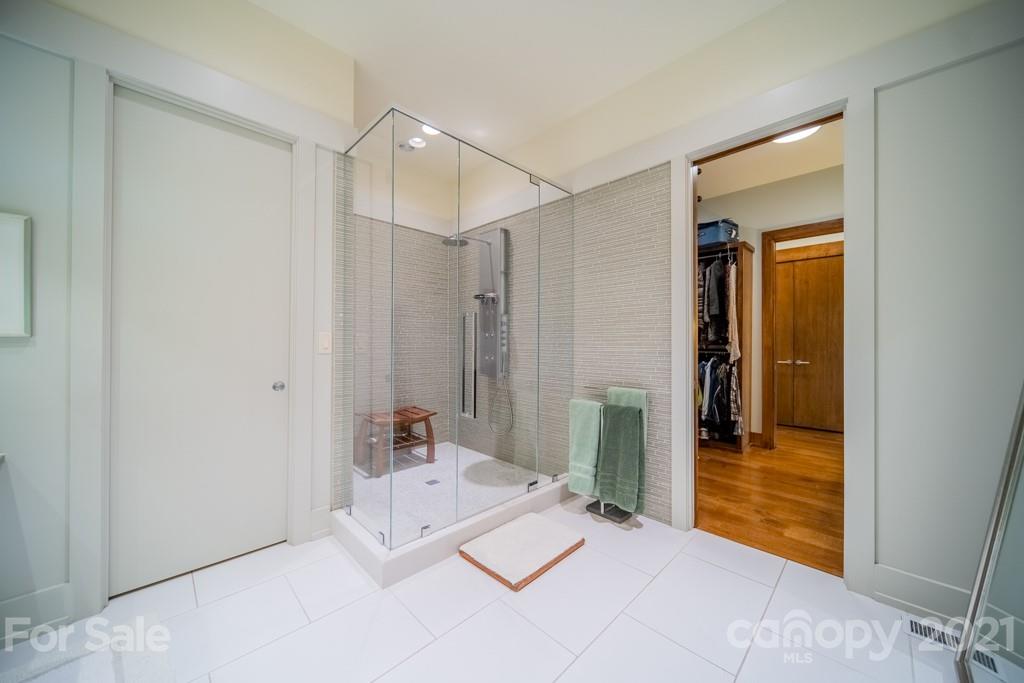 2827 Rothwood Drive Charlotte, NC 28211 - Photo 17 of 30 a en suite bathroom with a sink and a mirror