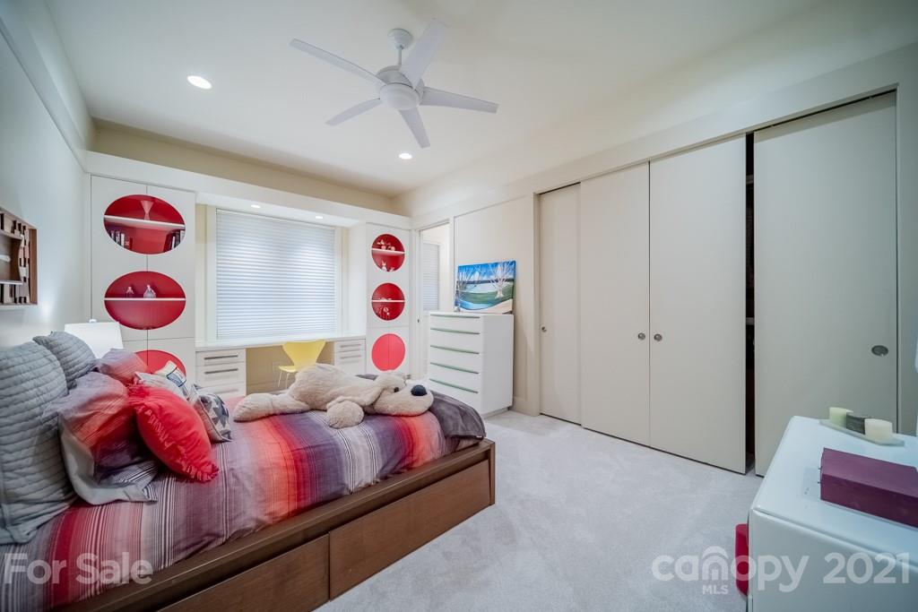 2827 Rothwood Drive Charlotte, NC 28211 - Photo 19 of 30 a bedroom with furniture and a window