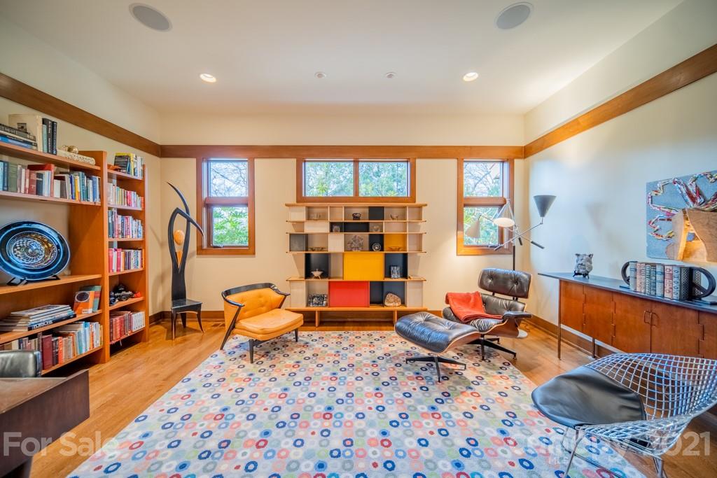 2827 Rothwood Drive Charlotte, NC 28211 - Photo 5 of 30 a living room with furniture a rug and a large window