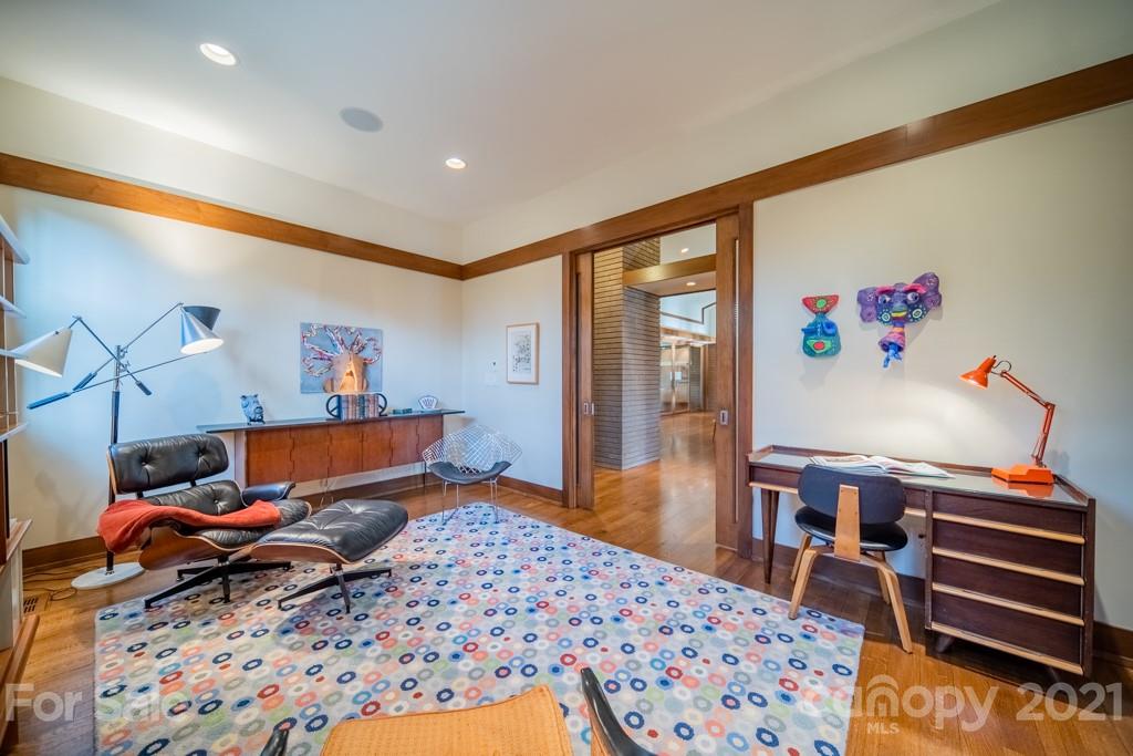 2827 Rothwood Drive Charlotte, NC 28211 - Photo 6 of 30 a workspace with furniture and window