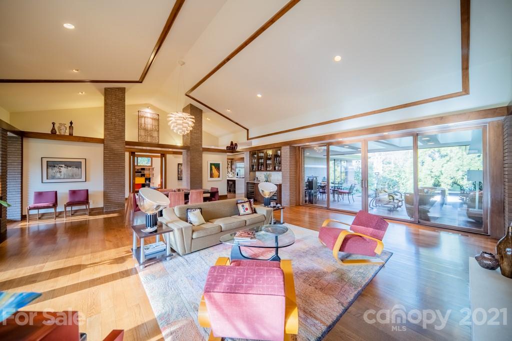 2827 Rothwood Drive Charlotte, NC 28211 - Photo 10 of 30 a living room with furniture and floor to ceiling windows