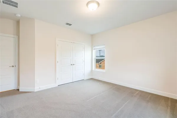 a bathroom with a sink toilet a mirror and shower