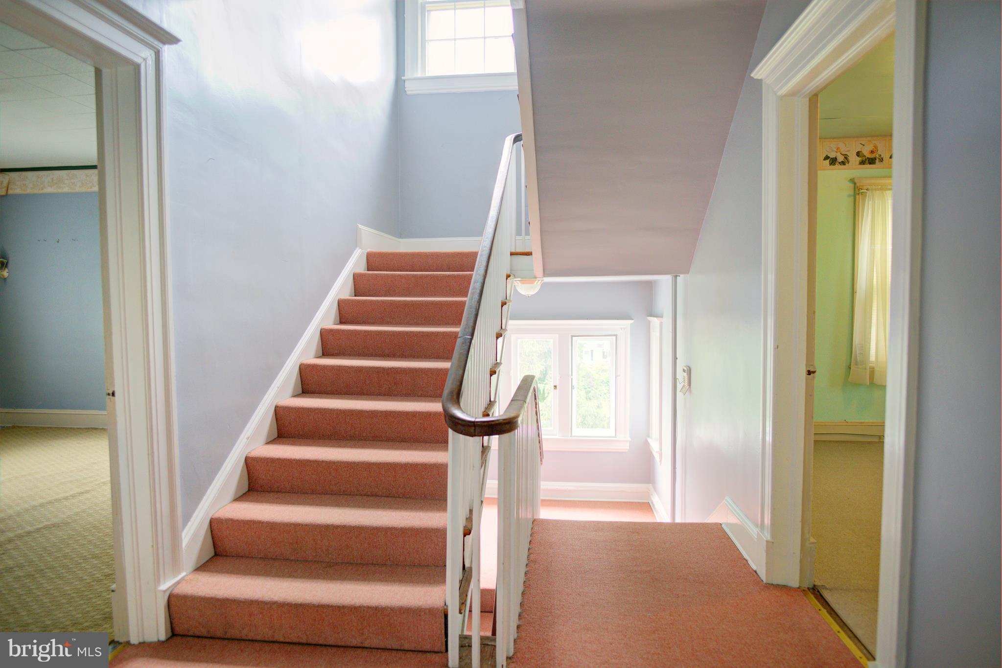 408 Hawthorne Road Linthicum Heights, MD 21090 - Photo 22 of 25 a view of staircase with wooden floor and stairs