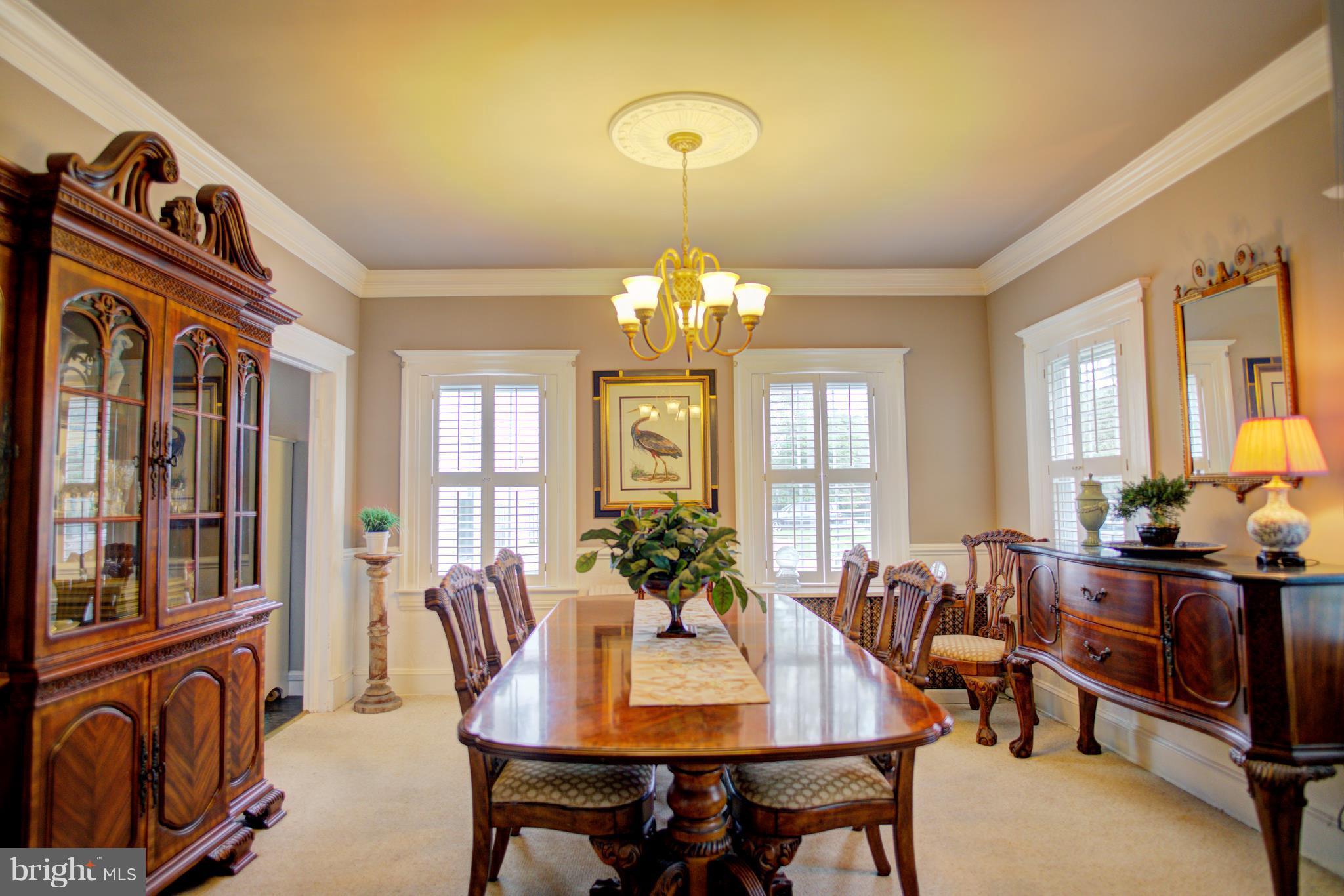 408 Hawthorne Road Linthicum Heights, MD 21090 - Photo 6 of 25 a view of a a dining room with furniture window and wooden floor
