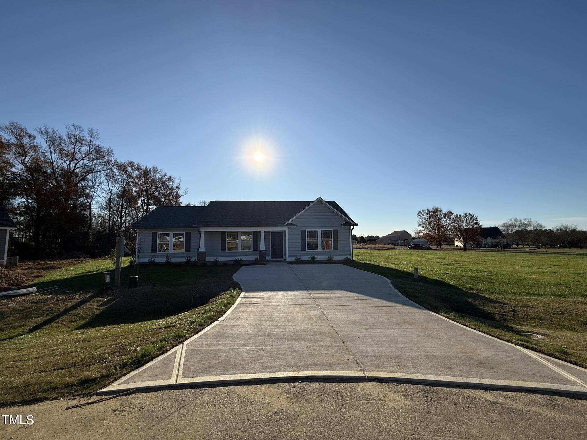198 Pate Landing Drive Selma, NC 27576 - Photo 2 of 16 a front view of a house with a yard