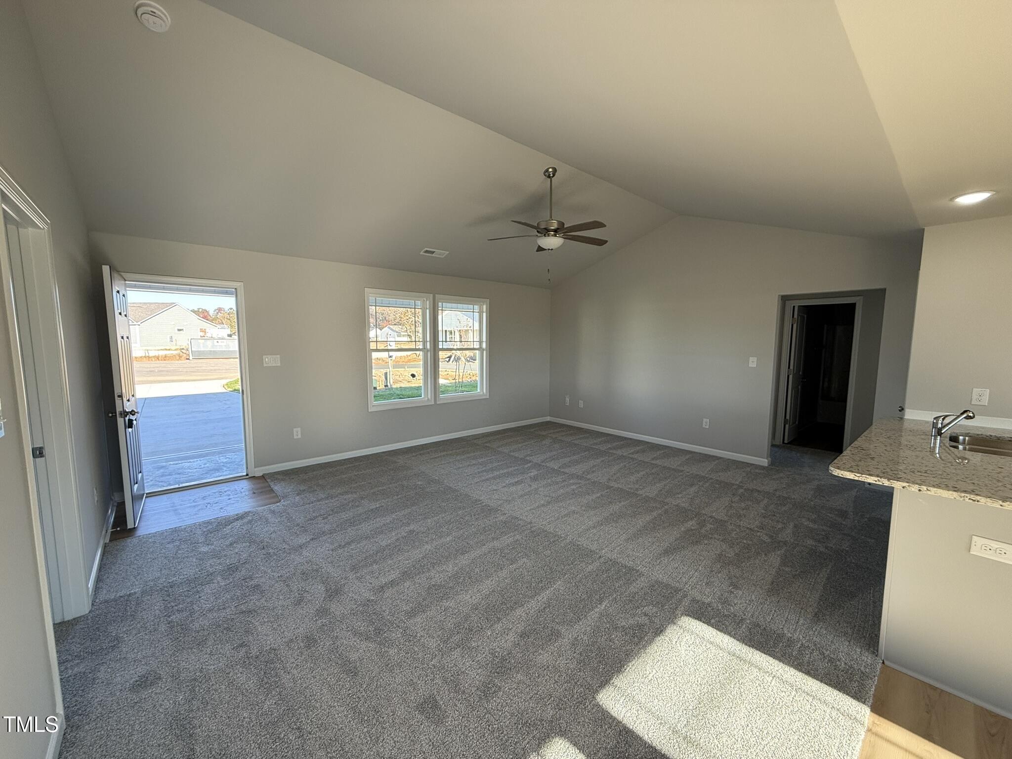 198 Pate Landing Drive Selma, NC 27576 - Photo 4 of 16 a view of an empty room with a window
