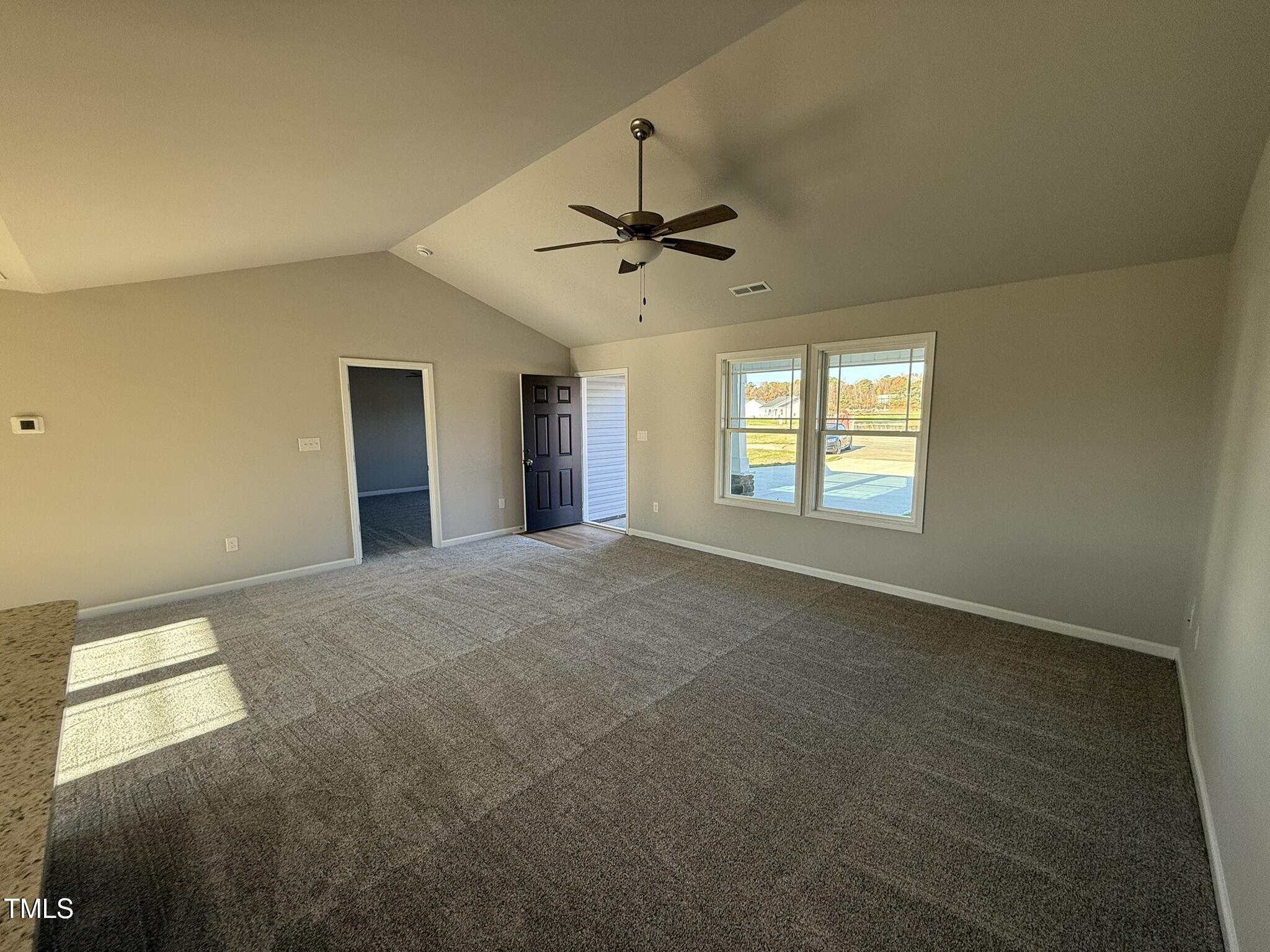 198 Pate Landing Drive Selma, NC 27576 - Photo 5 of 16 a view of an empty room with a window