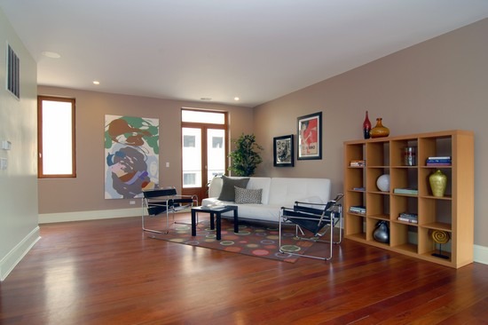 1152 West Fulton Street, Unit 3A Chicago, IL 60607 - Photo 2 of 8 a living room with furniture window and wooden floor