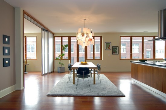 1152 West Fulton Street, Unit 3A Chicago, IL 60607 - Photo 3 of 8 a living room with furniture large window and wooden floor