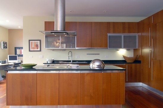 1152 West Fulton Street, Unit 3A Chicago, IL 60607 - Photo 4 of 8 a kitchen with stainless steel appliances granite countertop a sink stove and cabinets