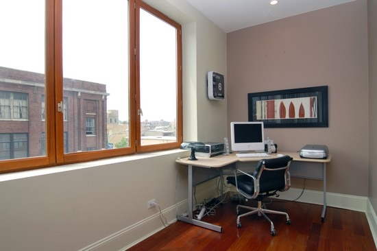 1152 West Fulton Street, Unit 3A Chicago, IL 60607 - Photo 7 of 8 a view of a workspace with furniture and a window