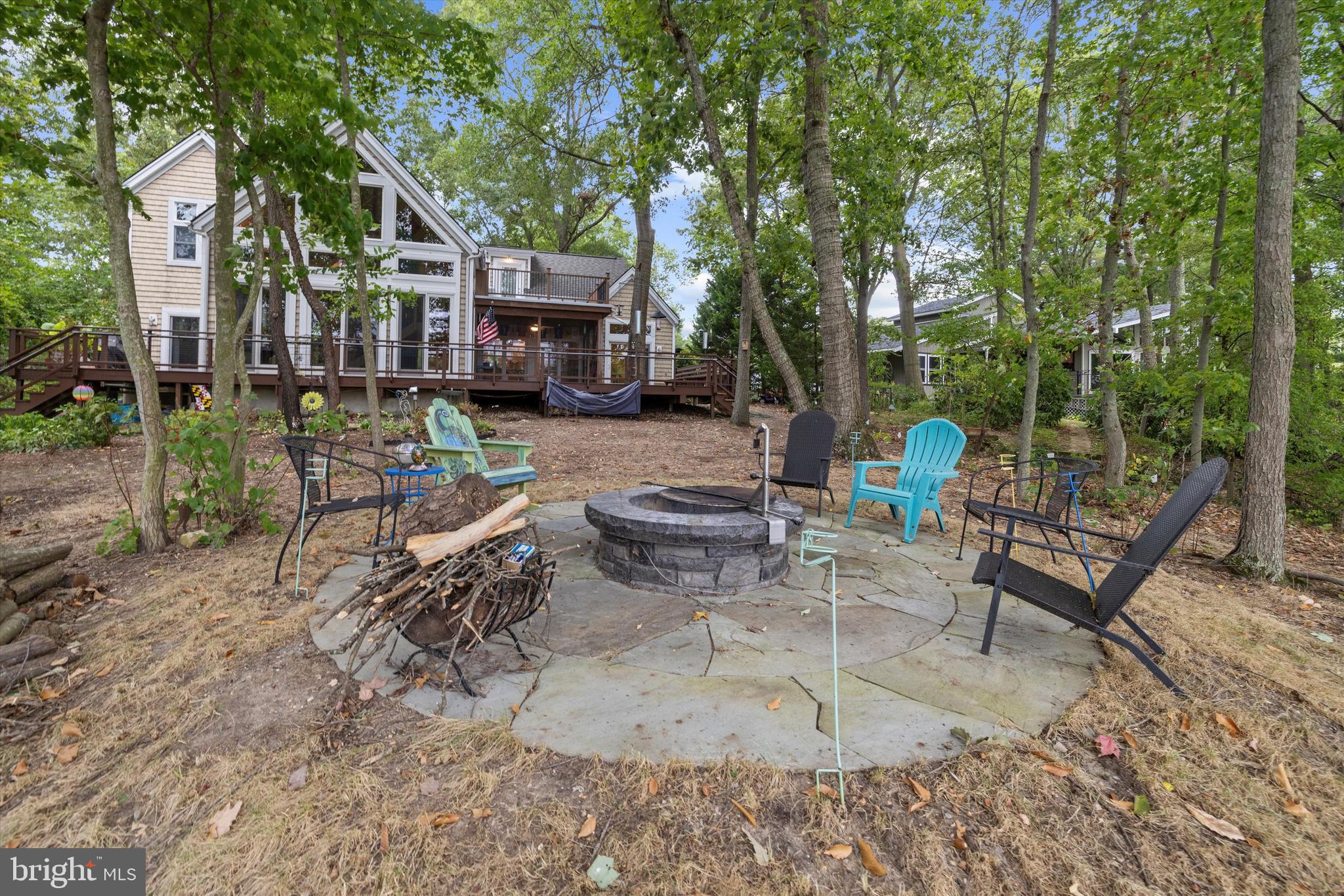 10761 Kasota Road Chestertown, MD 21620 - Photo 34 of 47 a view of a patio with table and chairs and potted plants