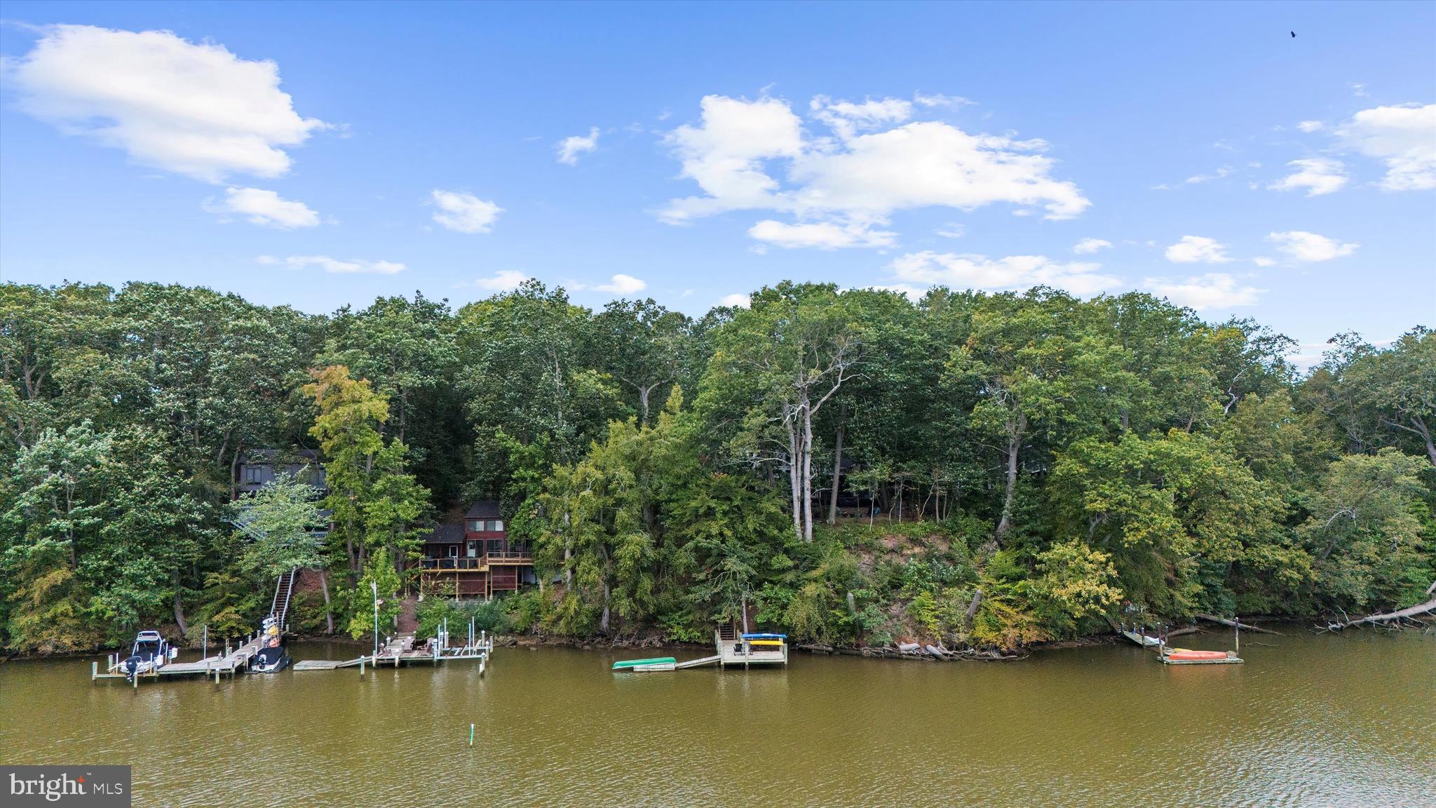 10761 Kasota Road Chestertown, MD 21620 - Photo 38 of 47 an aerial view of residential houses with outdoor space and trees all around