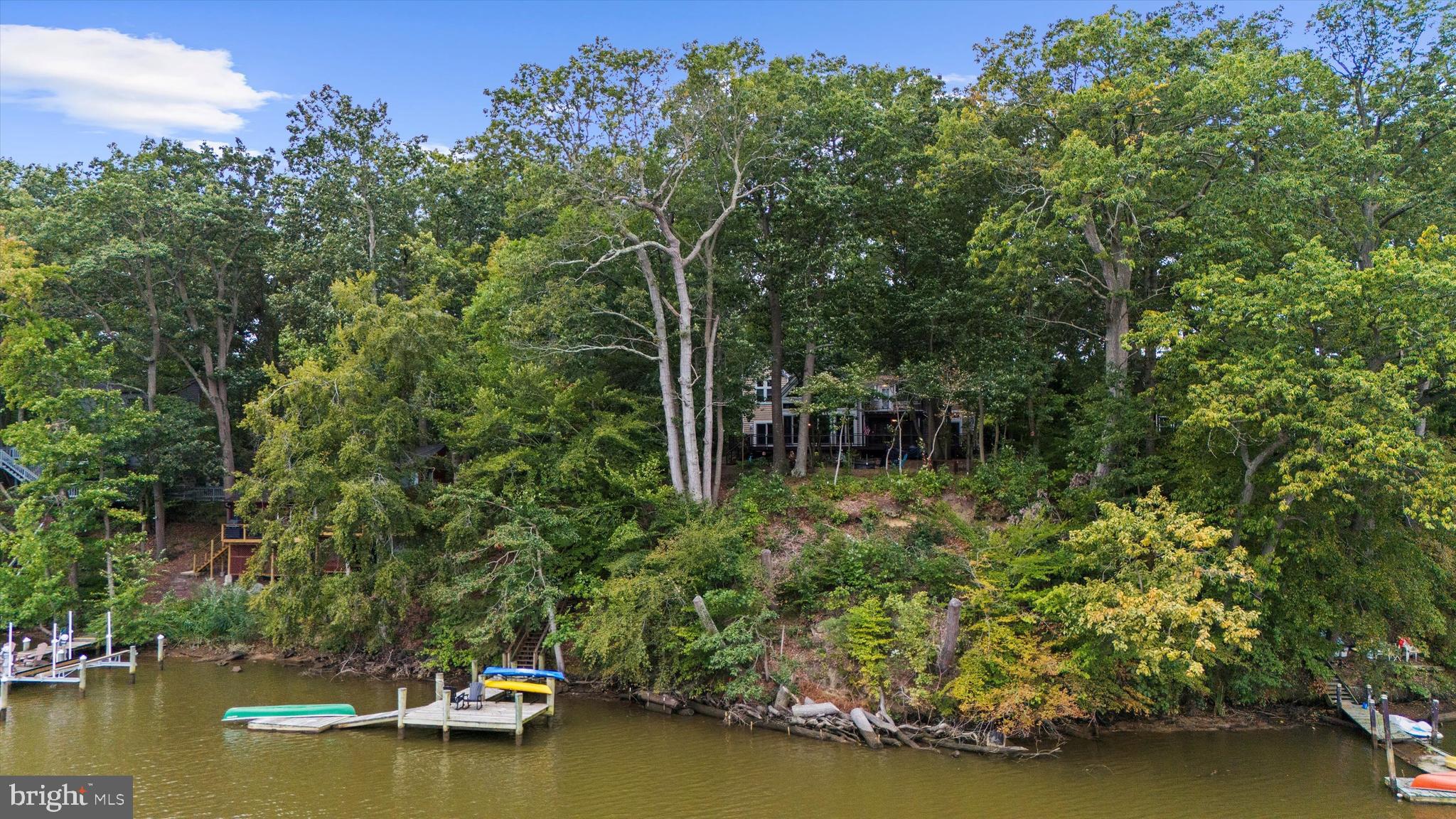 10761 Kasota Road Chestertown, MD 21620 - Photo 39 of 47 a view of a lake with houses in the background