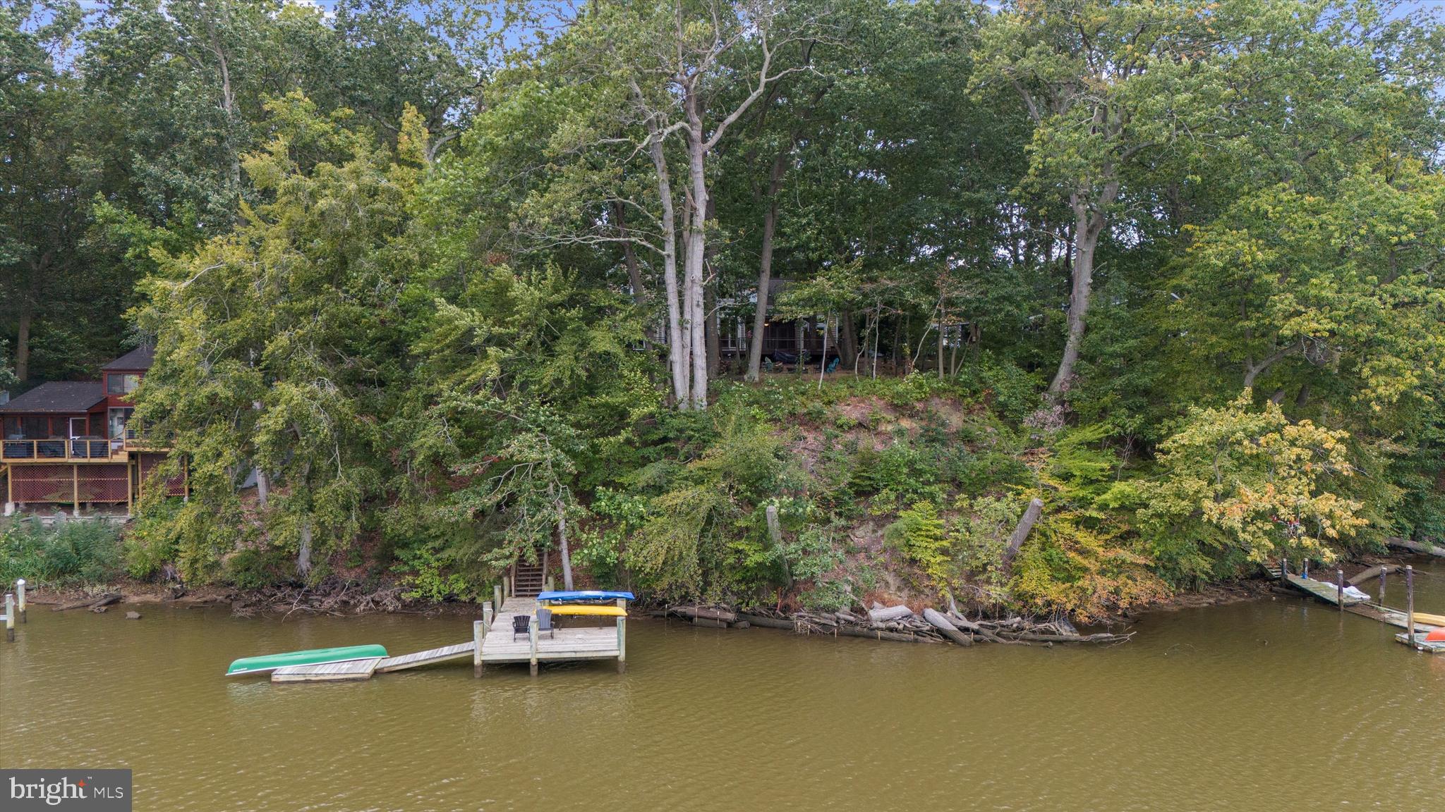 10761 Kasota Road Chestertown, MD 21620 - Photo 41 of 47 a small pool with trees in the background