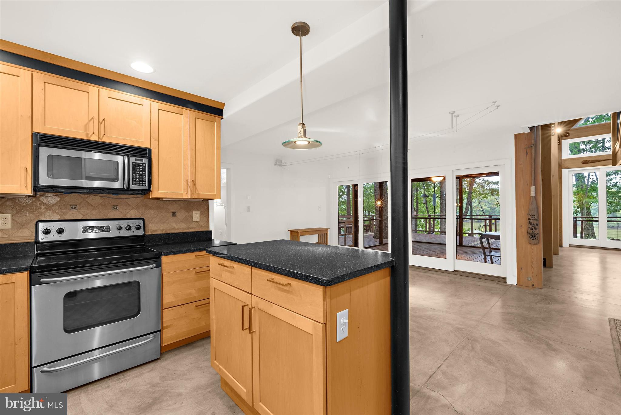 10761 Kasota Road Chestertown, MD 21620 - Photo 10 of 47 a kitchen with stainless steel appliances granite countertop a stove a sink and a microwave