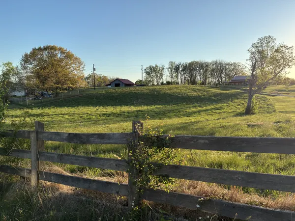 a view of a lake with a big yard