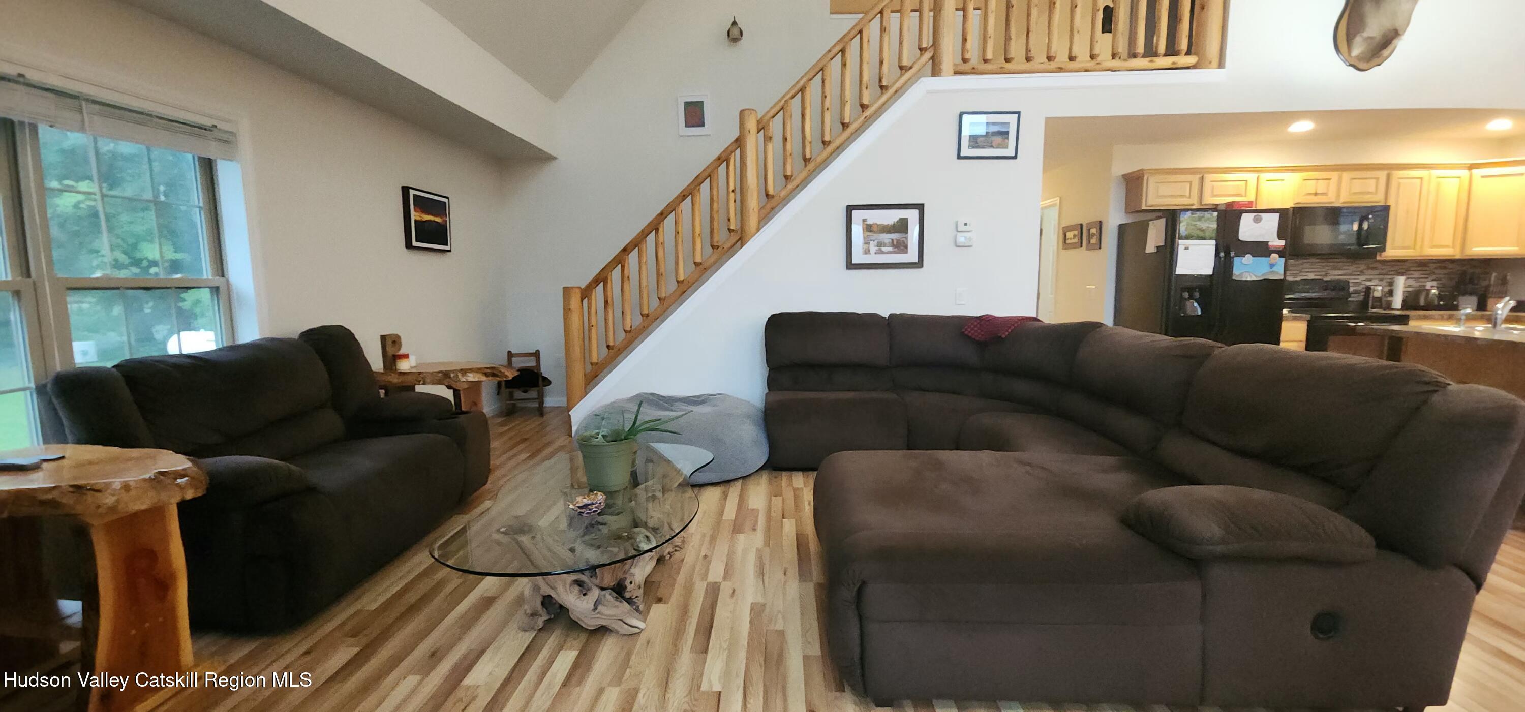 89 Zinno Road Ashland, NY 12496 - Photo 12 of 41 a living room with furniture and a large window