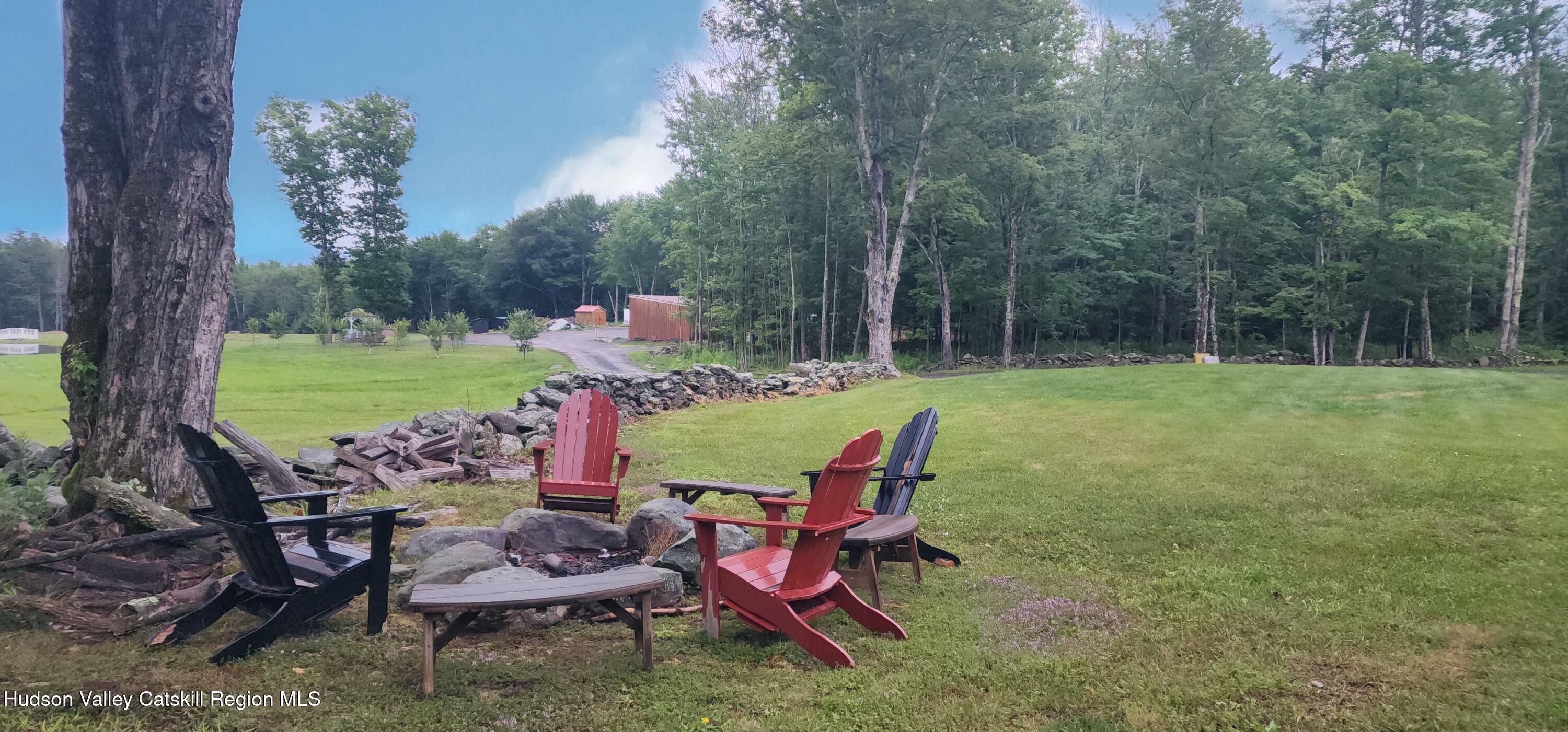 89 Zinno Road Ashland, NY 12496 - Photo 7 of 41 a view of a chairs and table in patio