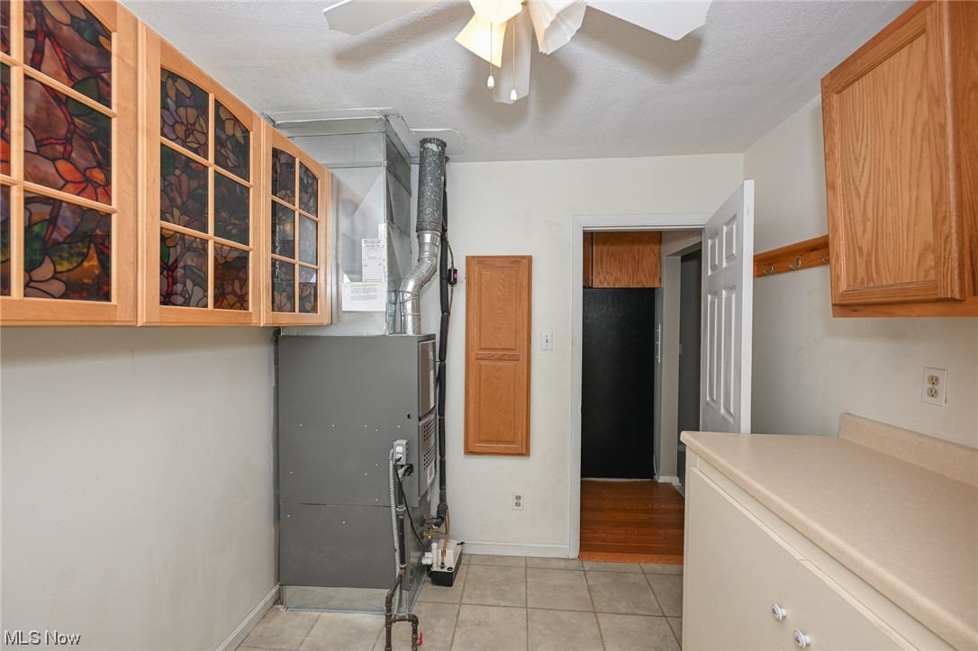 1509 McTaggart Road Stow, OH 44224 - Photo 28 of 30 Utility room with Flowteck Ionizer calcium/stain remover for great tasting well water