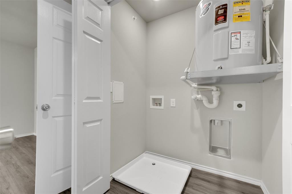 6108 Abrams Road, Unit 211 Dallas, TX 75231 - Photo 11 of 18 walk in closet with view of bathroom