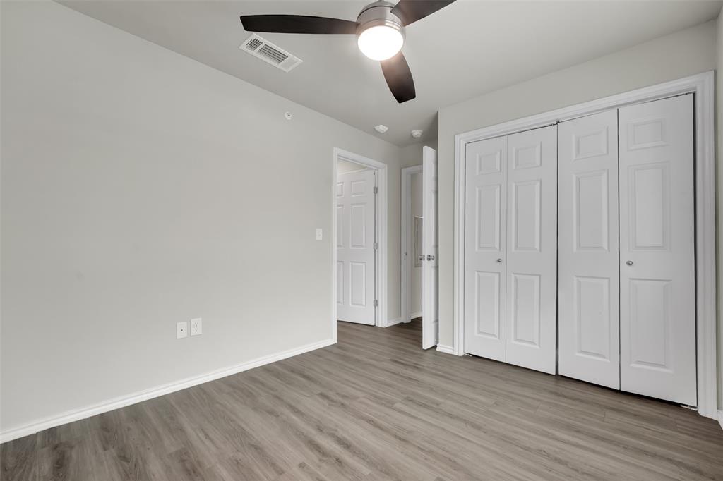 6108 Abrams Road, Unit 211 Dallas, TX 75231 - Photo 12 of 18 wooden floor in an empty room