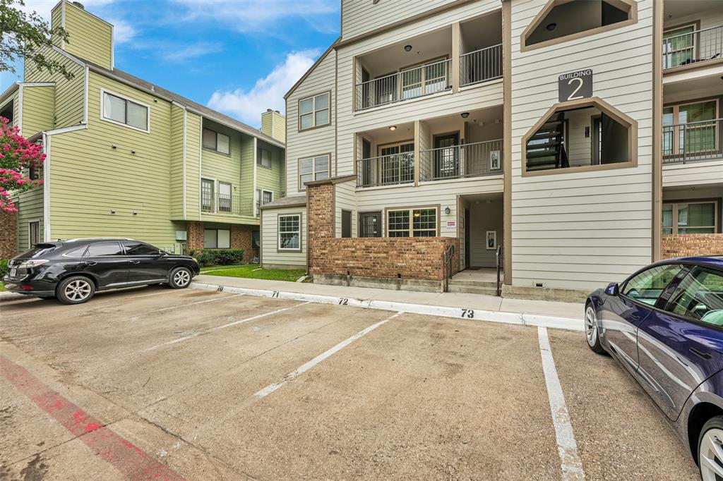 6108 Abrams Road, Unit 211 Dallas, TX 75231 - Photo 16 of 18 a car parked in front of a building