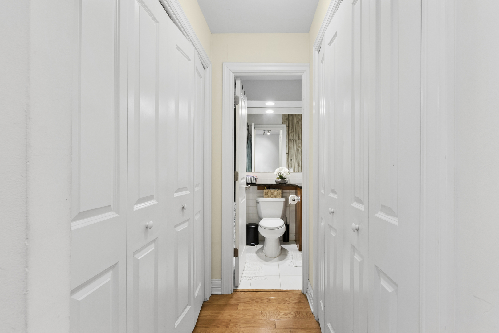 3033 North Sheridan Road, Unit 1502 Chicago, IL 60657 - Photo 8 of 19 a bathroom with a sink and mirror