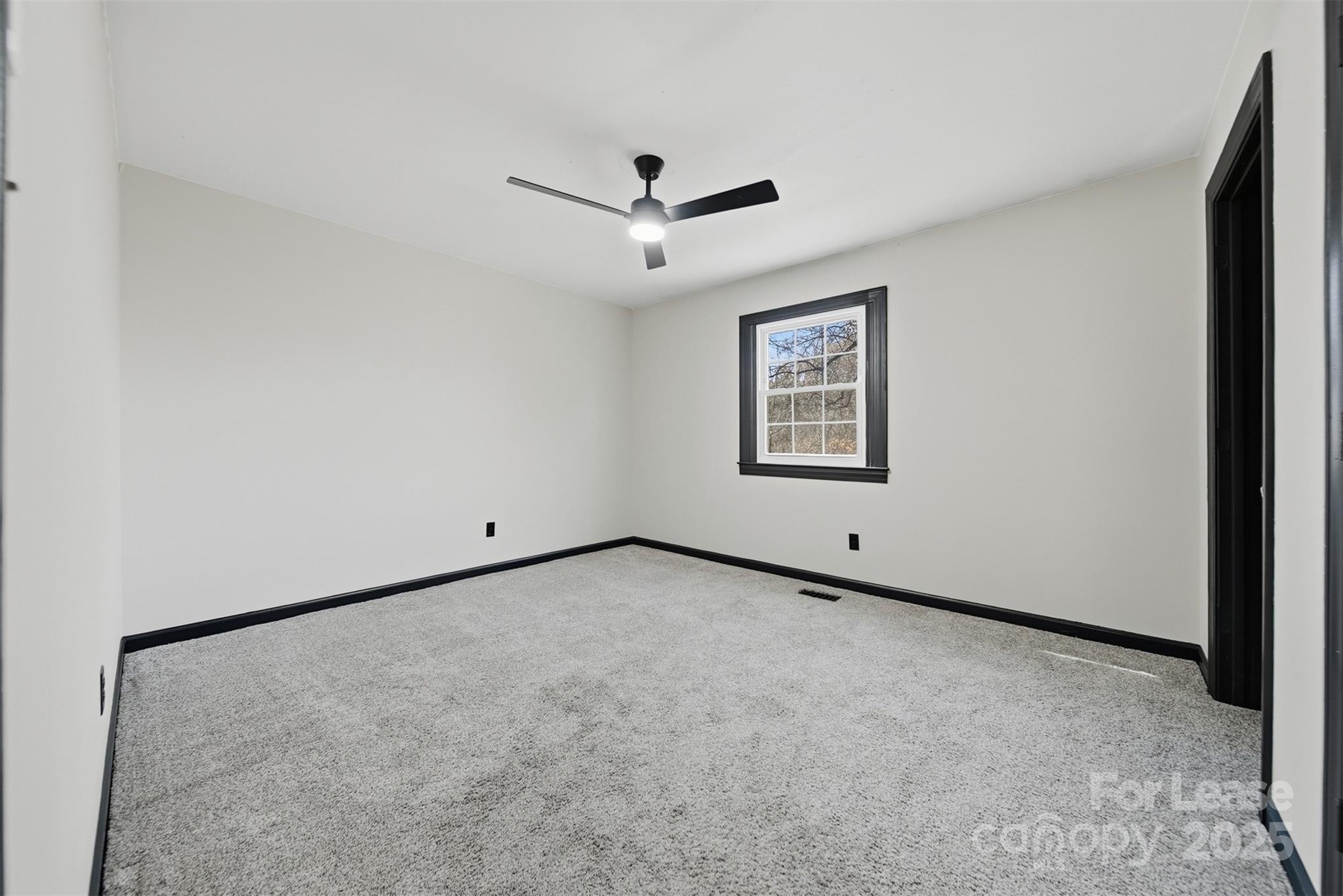2705 North Center Street, Unit 78 Hickory, NC 28601 - Photo 13 of 17 a view of an empty room with a window