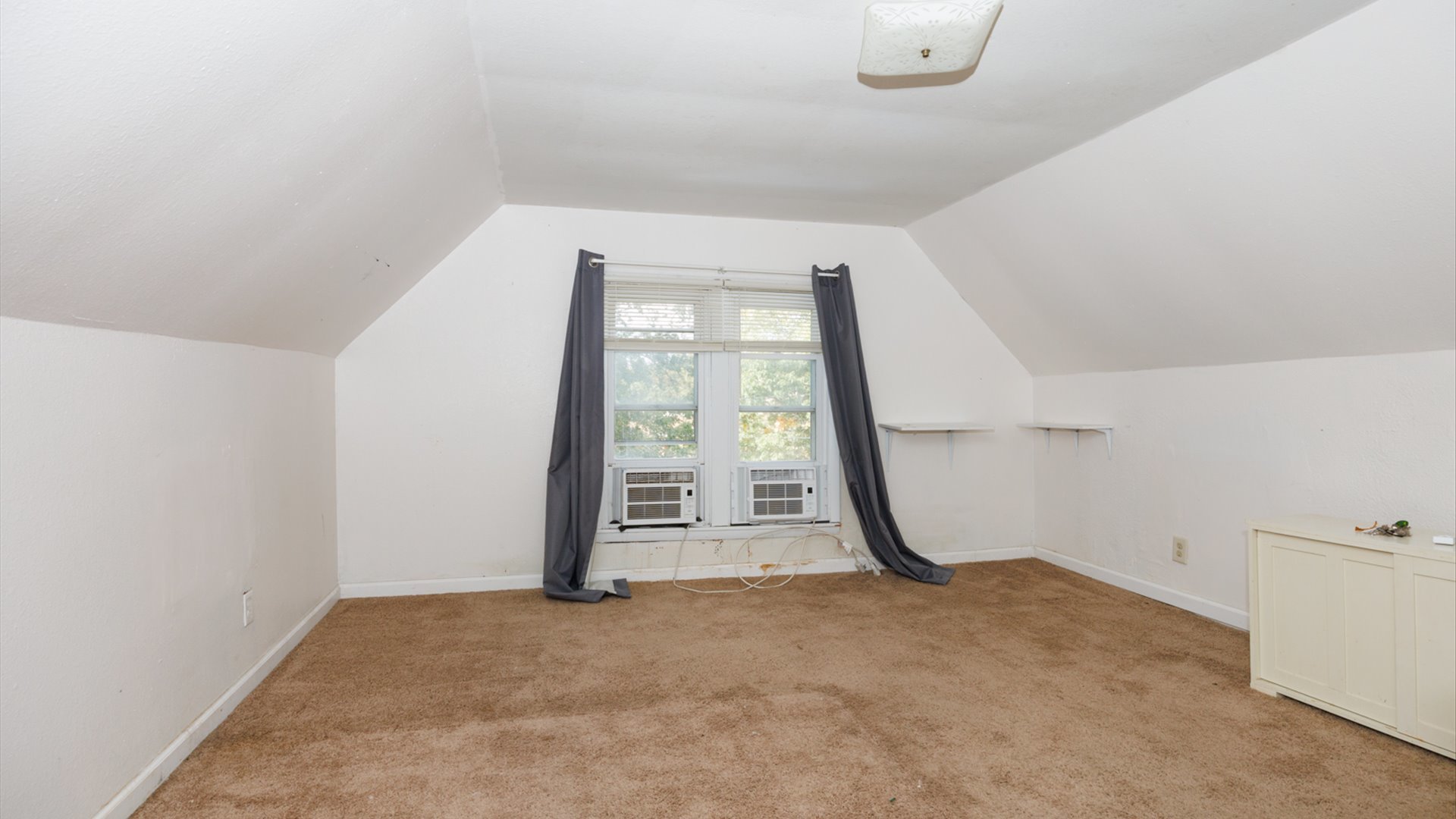 802 South Madison Street Bloomington, IL 61701 - Photo 26 of 33 a view of a room with air conditioner and a window