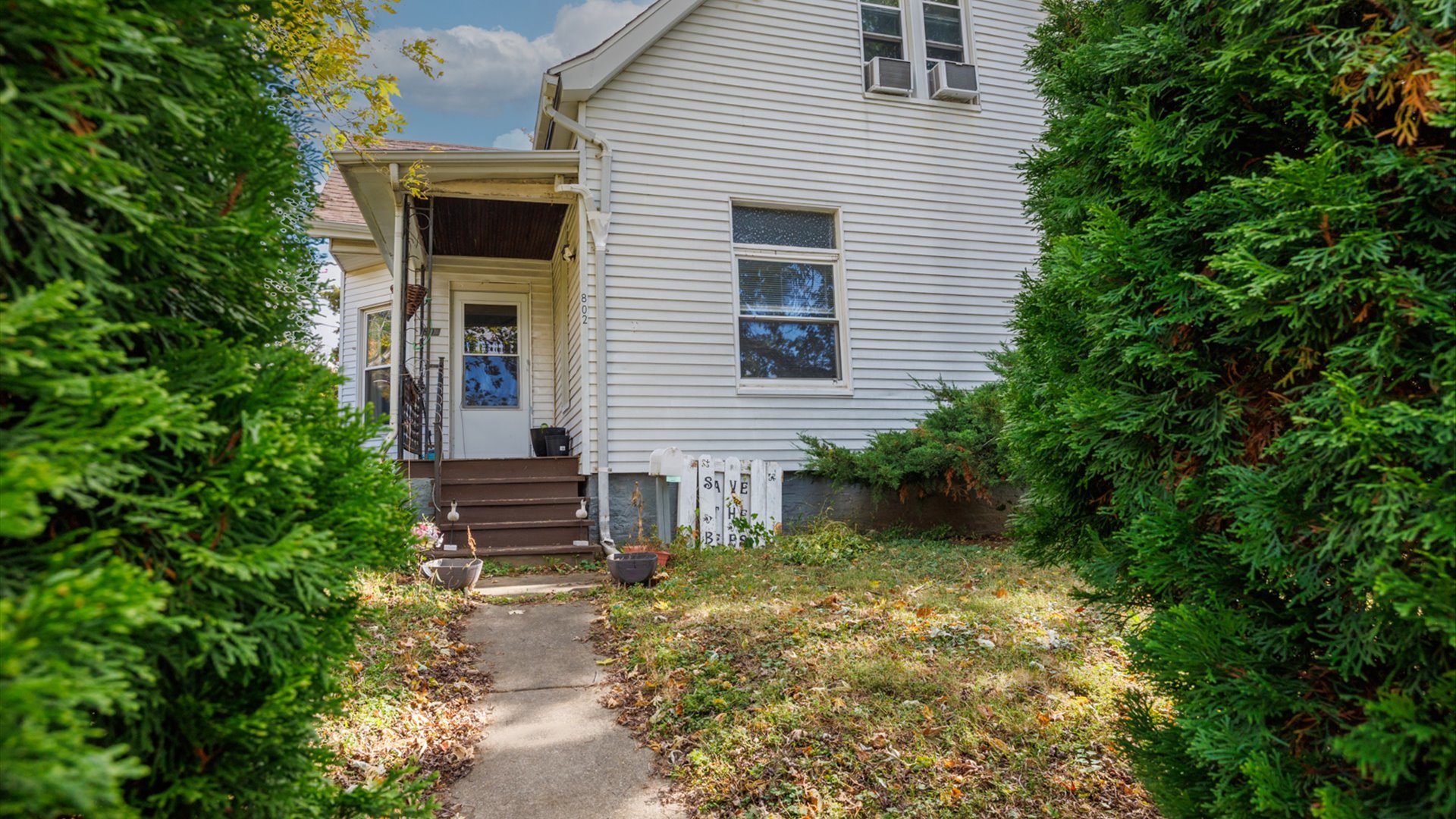 802 South Madison Street Bloomington, IL 61701 - Photo 7 of 33 a view of a house with a yard