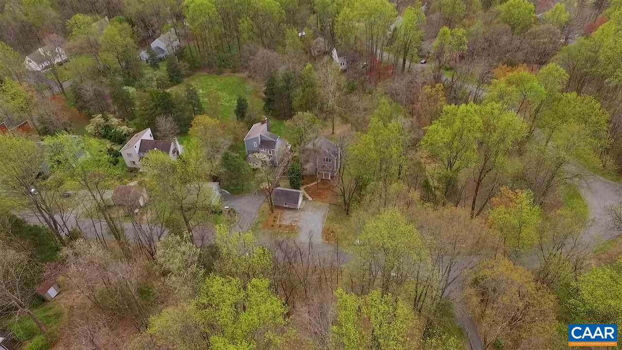 267 Turkey Ridge Road Charlottesville, VA 22903 - Photo 33 of 35 a view of a lake view and covered with trees