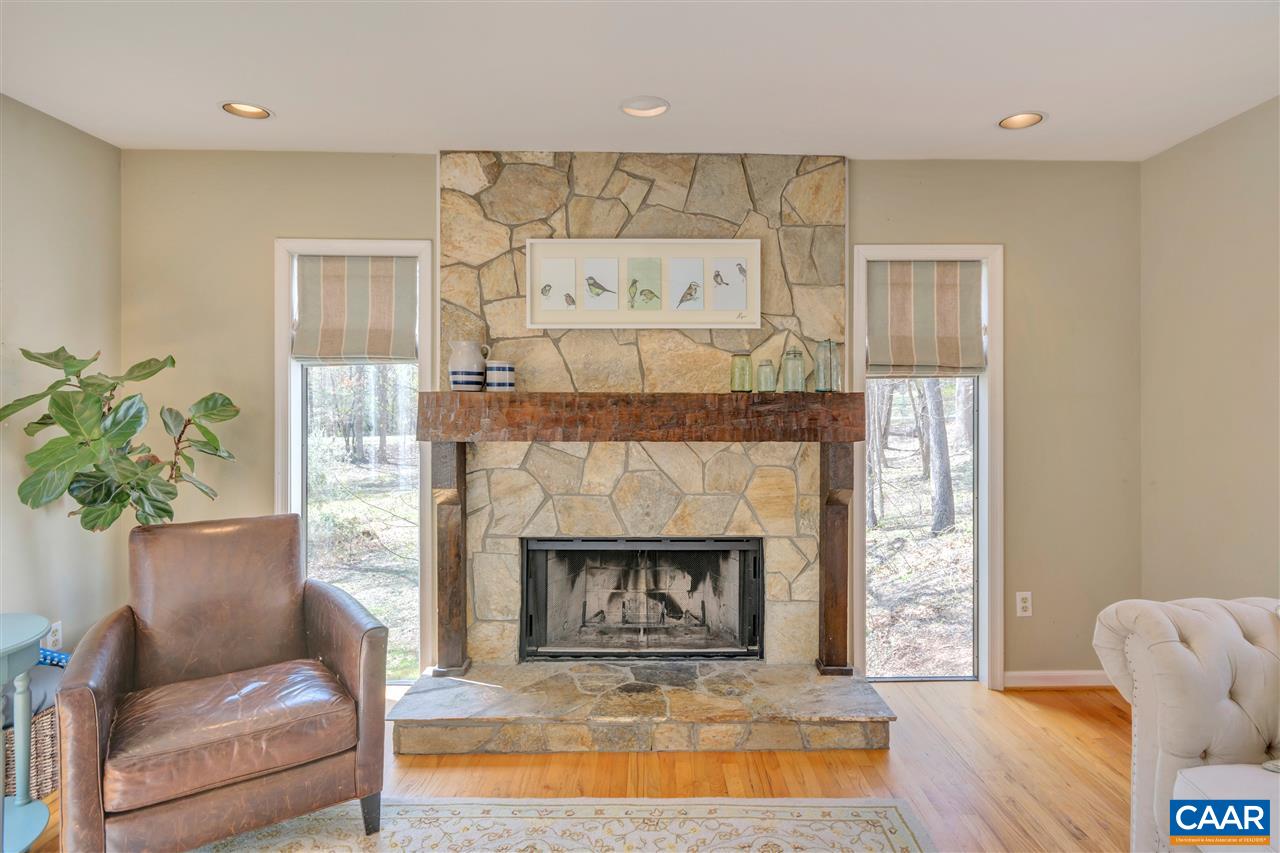 267 Turkey Ridge Road Charlottesville, VA 22903 - Photo 5 of 35 a living room with furniture and a fireplace